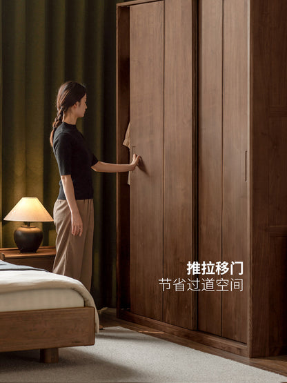 全实木移门衣柜卧室黑胡桃木推拉门储物柜小户型衣橱